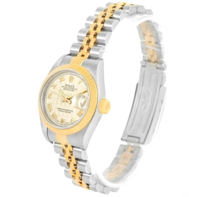 The Rolex Datejust 79173 Women's Stainless Steel Beige Dial 79173 Women's Stainless Steel Beige Dial watch is shown at a three-quarter angle, featuring its bracelet, crown, dial, and clasp.