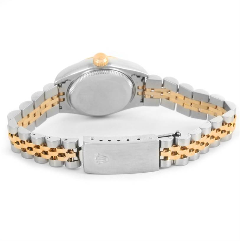 The image shows the back of a Rolex Datejust 79173 Women's Stainless Steel Beige Dial 79173 Women's Stainless Steel Beige Dial watch with a two-tone bracelet and clasp.