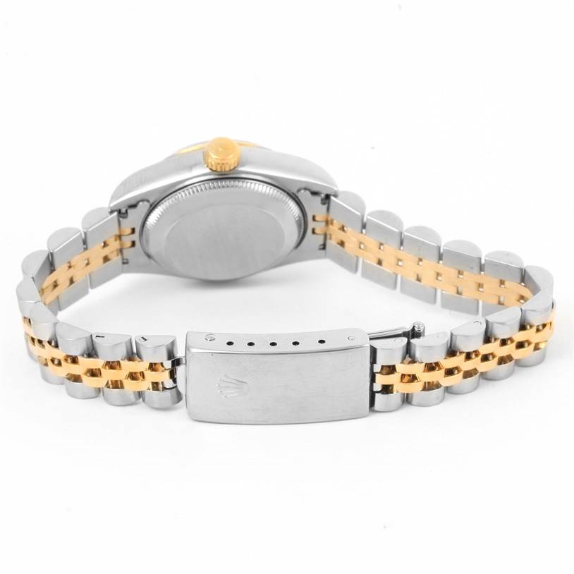 The image shows the back view of a Rolex Datejust 69173 Women
s Stainless Steel Black Dial 69173 Women
s Stainless Steel Black Dial watch, highlighting the case, crown, and bracelet with the clasp.