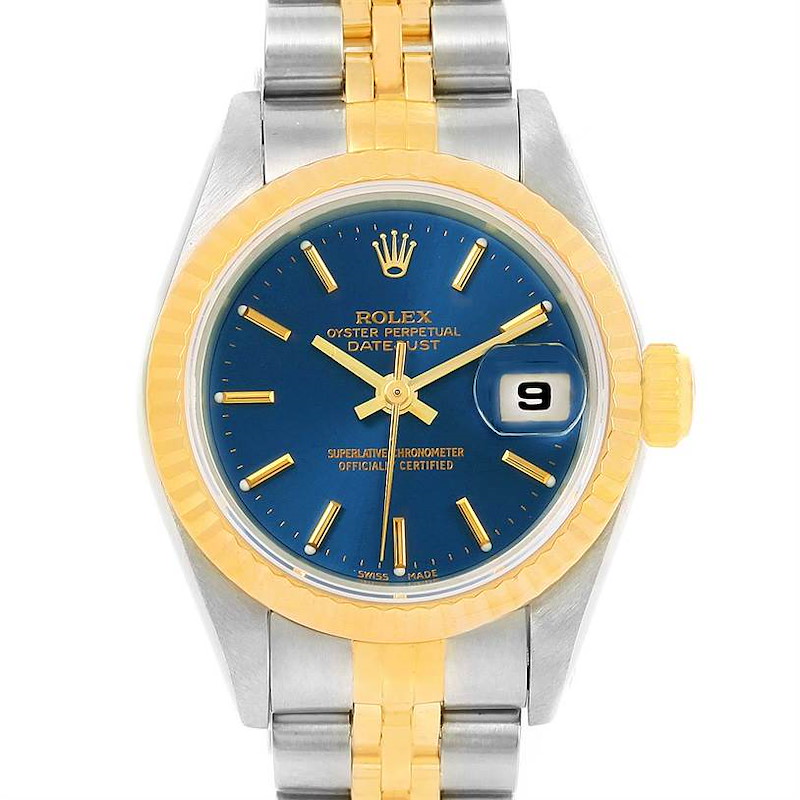 The image shows a front view of the Rolex Datejust watch, highlighting its blue dial, fluted bezel, date window, and two-tone bracelet.