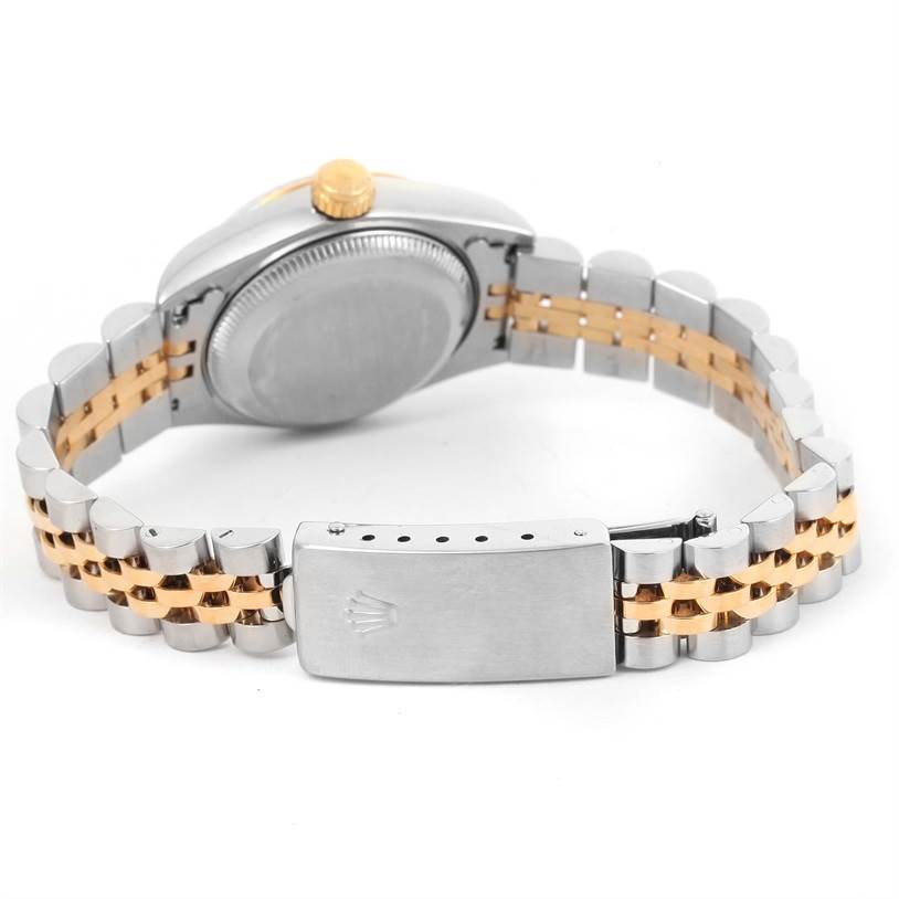 The image shows the back view of a Rolex Datejust 79173 Women's Stainless Steel Blue Dial 79173 Women's Stainless Steel Blue Dial watch, highlighting its clasp and two-tone metal bracelet.