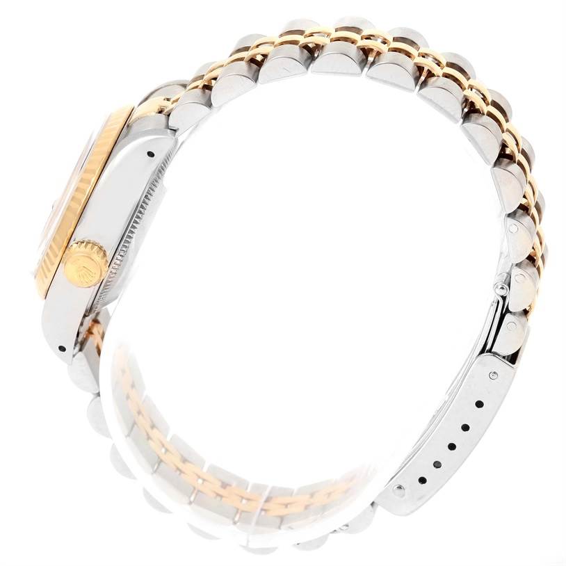 The image shows a side view of a Rolex Datejust 69173 Women's Stainless Steel Black Dial 69173 Women's Stainless Steel Black Dial watch, highlighting its two-tone bracelet and crown.