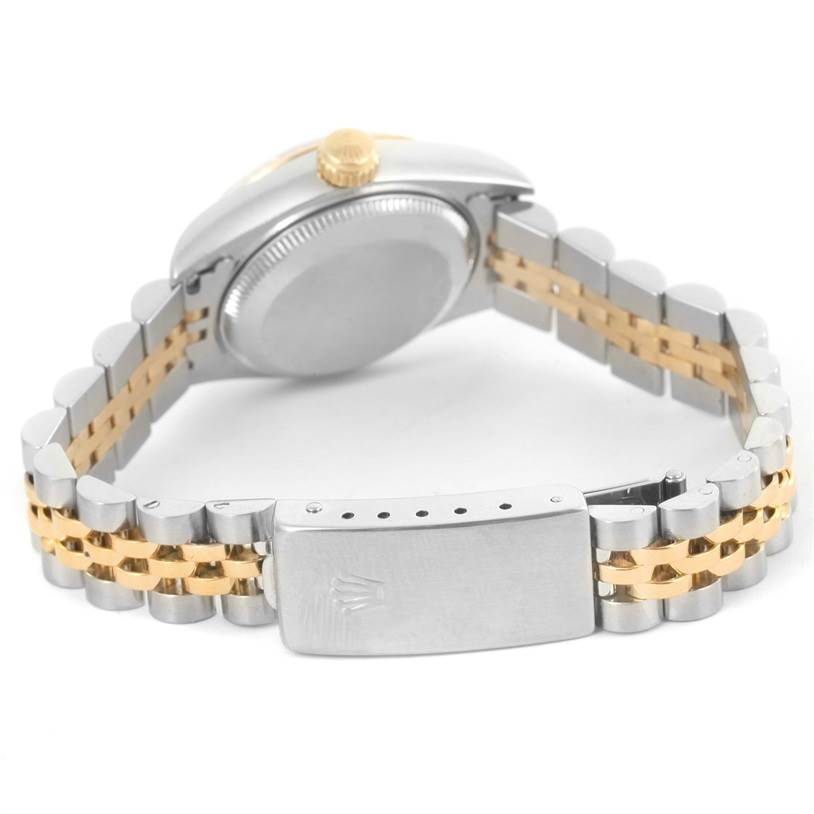 The image shows the back and side view of a Rolex Datejust 69173 Women
s Stainless Steel Champagne Dial 69173 Women
s Stainless Steel Champagne Dial watch, highlighting the clasp, case back, and two-tone bracelet.