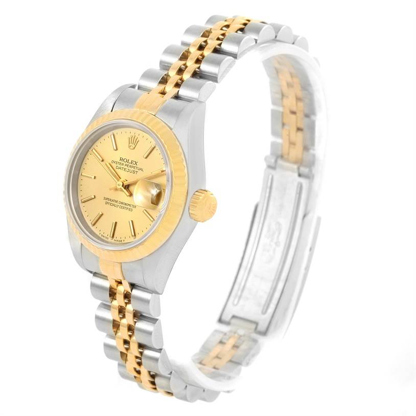 The Rolex Datejust 69173 Women
s Stainless Steel Champagne Dial 69173 Women
s Stainless Steel Champagne Dial watch is shown at a three-quarter angle displaying the face, crown, and part of the two-tone bracelet.