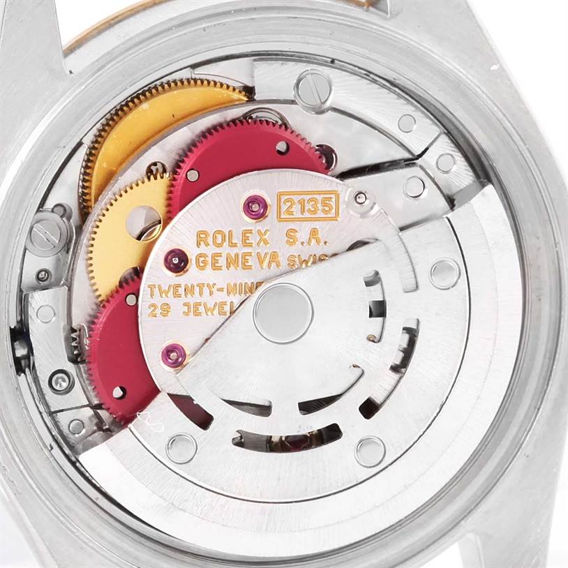 This image shows the internal mechanical movement of a Rolex Datejust 69173 Women
s Stainless Steel Champagne Dial 69173 Women
s Stainless Steel Champagne Dial watch, highlighting gears and the oscillating weight.