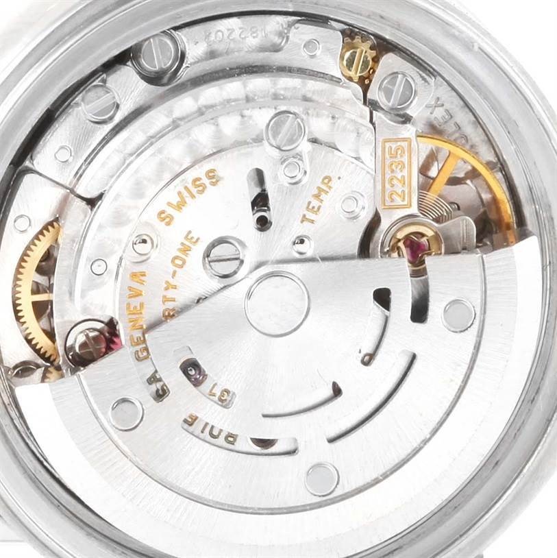 The image shows the intricate movement mechanism of the Rolex Datejust 79174 Women
s Stainless Steel Silver Dial 79174 Women
s Stainless Steel Silver Dial watch from a close-up, back view angle.