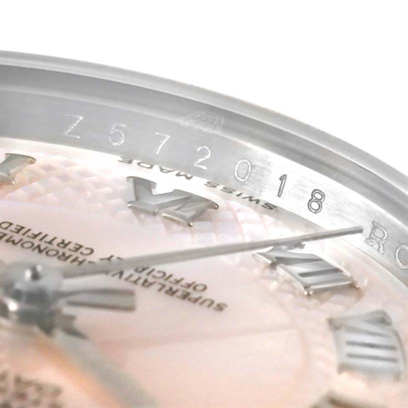 The image shows a close-up of the dial and bezel of a Rolex Datejust 179174 Women's Stainless Steel Mother of Pearl Dial 179174 Women's Stainless Steel Mother of Pearl Dial watch with visible Roman numerals and part of the serial number.