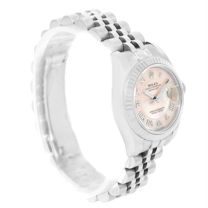 The image shows a Rolex Datejust 179174 Women's Stainless Steel Mother of Pearl Dial 179174 Women's Stainless Steel Mother of Pearl Dial watch at an angled side view, highlighting its dial, bezel, and bracelet.