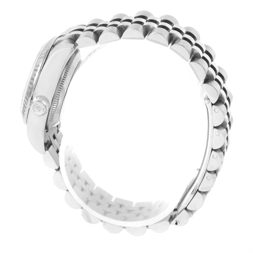 The image shows a side view of a Rolex Datejust 179174 Women's Stainless Steel Mother of Pearl Dial 179174 Women's Stainless Steel Mother of Pearl Dial watch, highlighting the crown and the bracelet links.