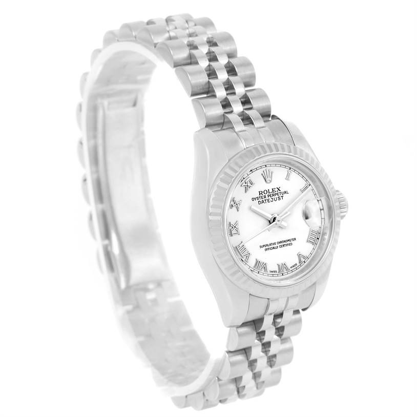 The Rolex Datejust 179174 Women
s Stainless Steel White Dial 179174 Women
s Stainless Steel White Dial watch is shown from an angled perspective, highlighting the dial, bezel, and bracelet.