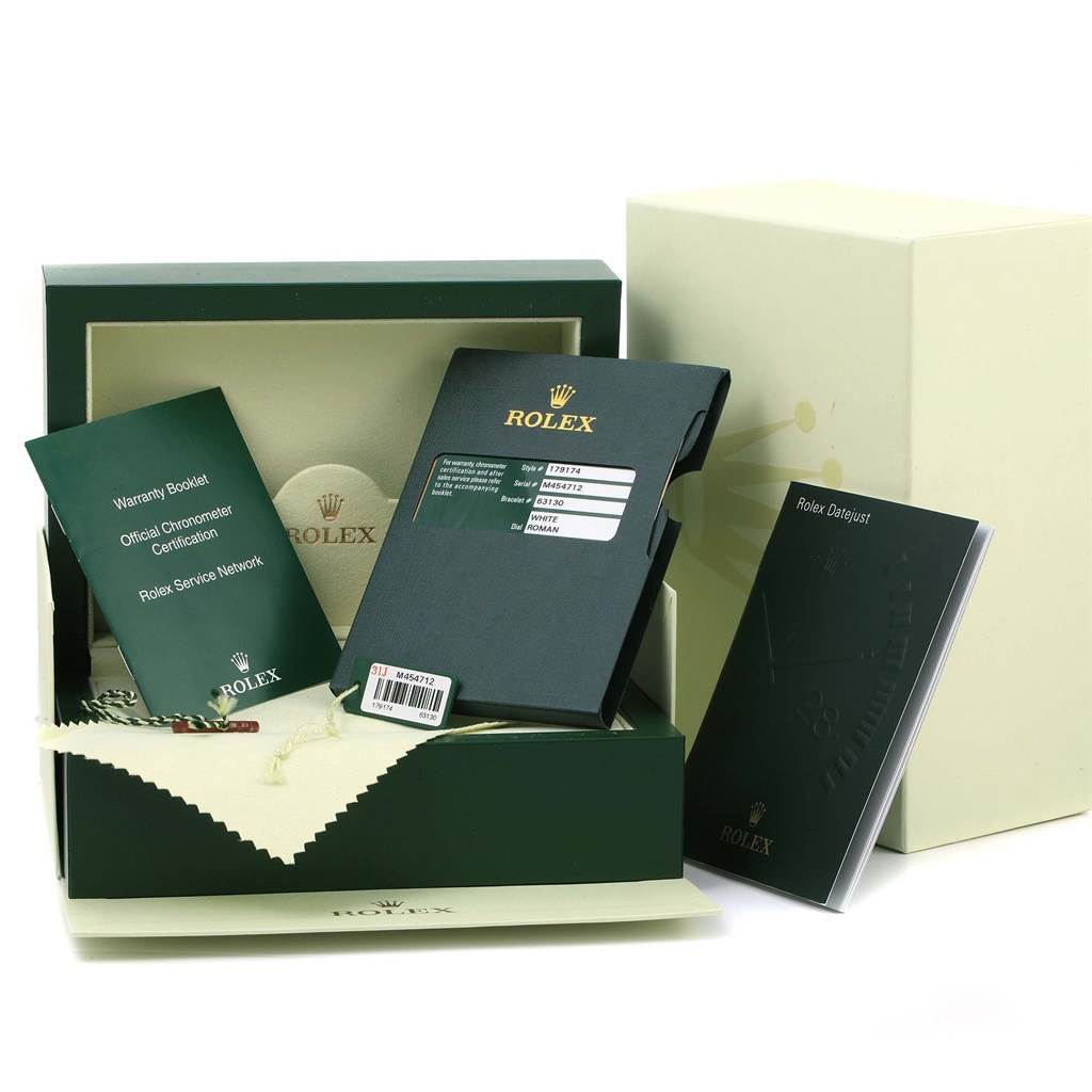 This image shows the box, manuals, and accessories for a Rolex Datejust 179174 Women
s Stainless Steel White Dial 179174 Women
s Stainless Steel White Dial watch.