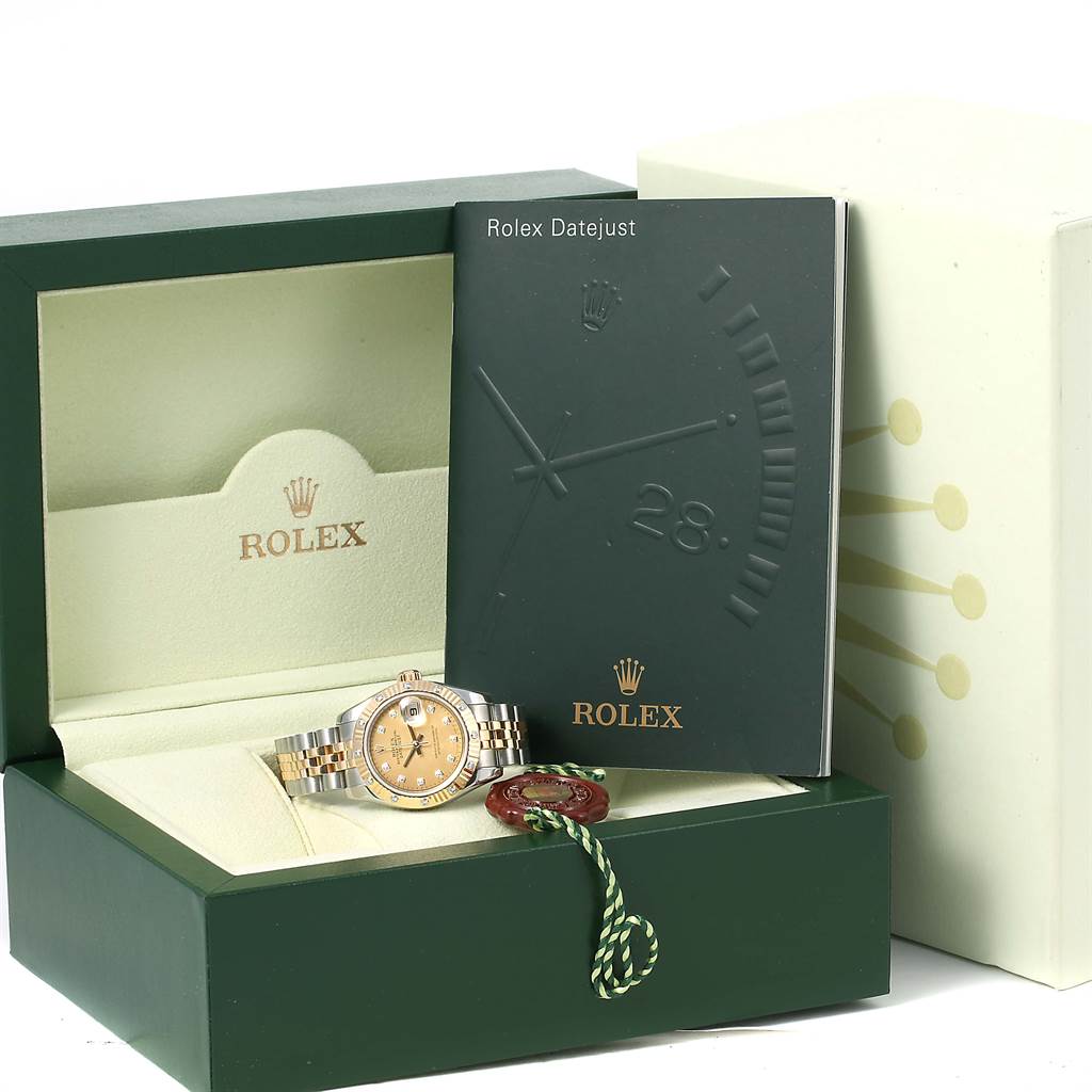 The image shows a Rolex Datejust 179313 Women's Stainless Steel Champagne Dial 179313 Women's Stainless Steel Champagne Dial watch in its box with a Rolex booklet and a certification tag.