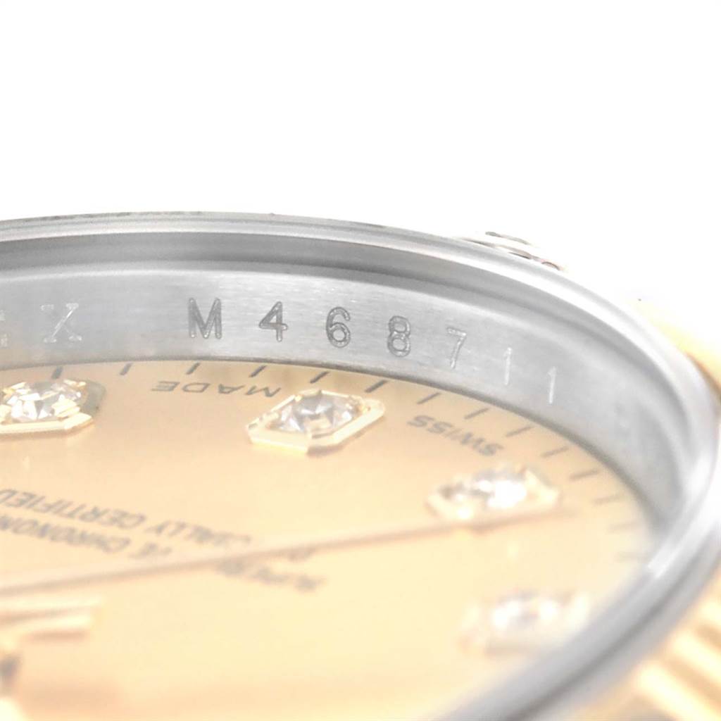 The image shows a close-up angle of the dial and inner bezel of a Rolex Datejust 179313 Women's Stainless Steel Champagne Dial 179313 Women's Stainless Steel Champagne Dial watch.