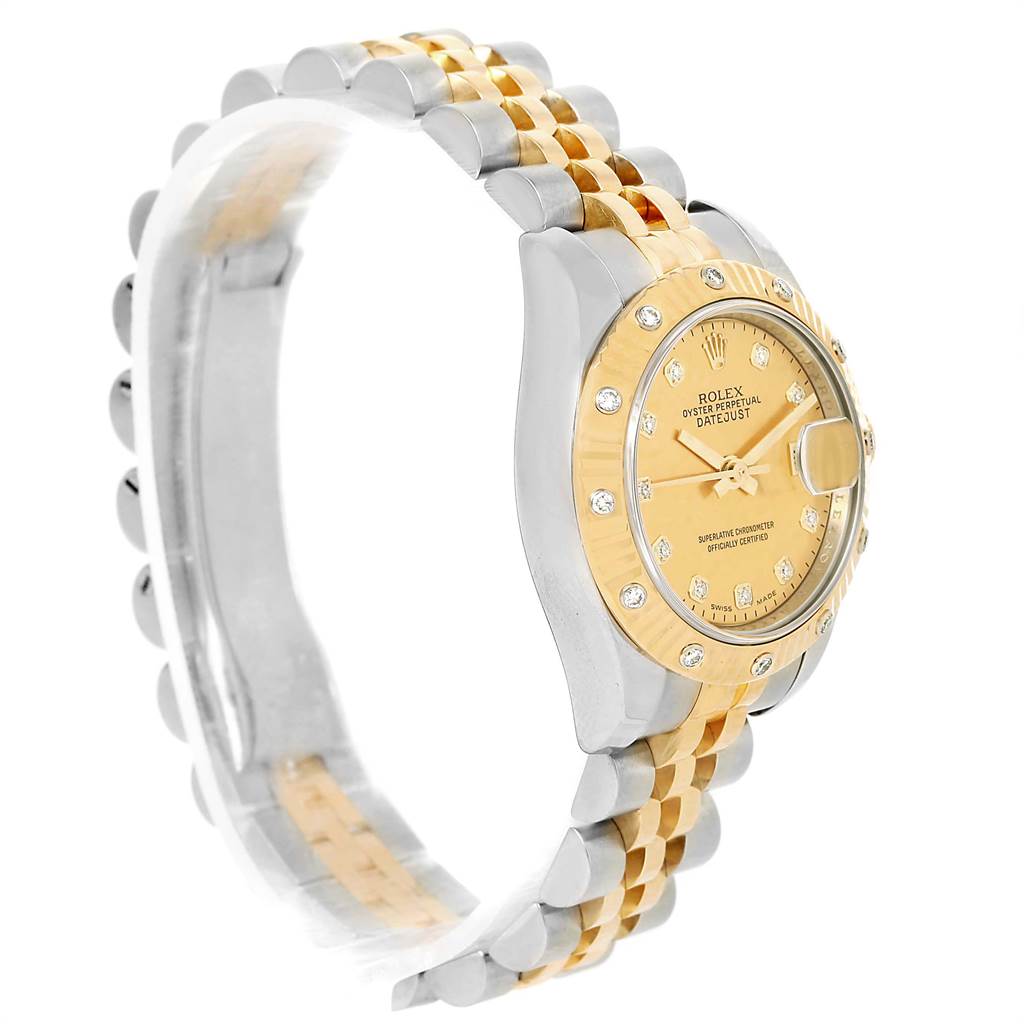 This image shows a side-angle view of a Rolex Datejust 179313 Women's Stainless Steel Champagne Dial 179313 Women's Stainless Steel Champagne Dial watch, displaying its two-tone bracelet, bezel, and dial.