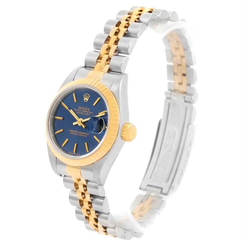 The image shows a Rolex Datejust 69173 Women's Stainless Steel Blue Dial 69173 Women's Stainless Steel Blue Dial watch at a slight angle, highlighting its blue dial, gold fluted bezel, and two-tone bracelet.
