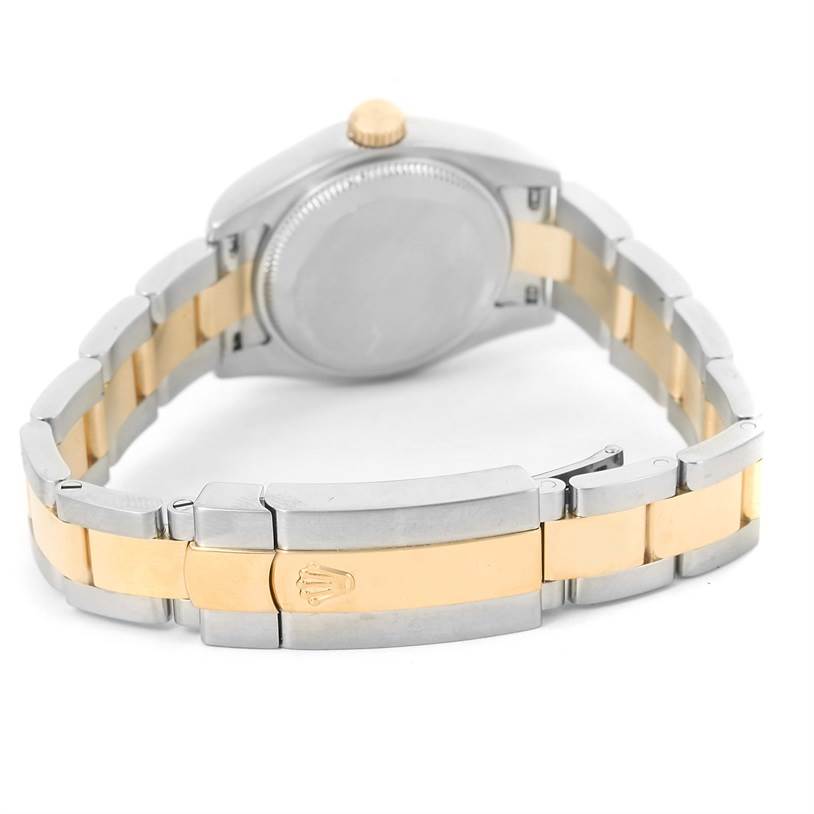 This image shows the back side and bracelet of a Rolex Datejust 179163 Women's Steel and Gold (two tone) Silver Dial 179163 Women's Steel and Gold (two tone) Silver Dial watch, displaying its two-tone metal design.