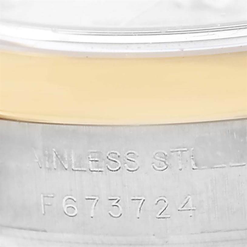 This image shows a close-up of the stainless steel case back with serial number engraving on a Rolex Datejust 179163 Women's Steel and Gold (two tone) Silver Dial 179163 Women's Steel and Gold (two tone) Silver Dial watch.