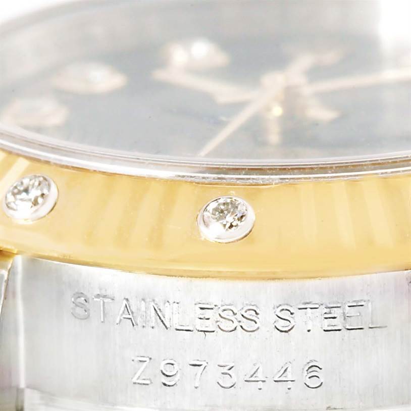 The image shows a close-up angle of a Rolex Datejust 179313 Women's Black Dial 179313 Women's Black Dial, focusing on the bezel with diamonds and part of the stainless steel case.