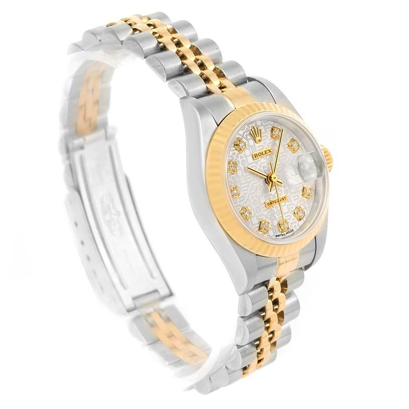 This image shows the Rolex Datejust 79173 Women's Stainless Steel Silver Dial 79173 Women's Stainless Steel Silver Dial watch from a three-quarter angle, highlighting the dial, bezel, and two-tone bracelet.
