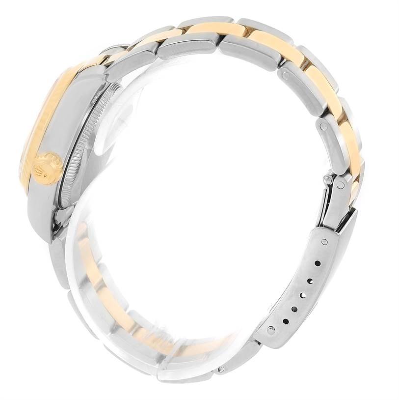 The image shows a side view of a Rolex Datejust 79173 Women
s Stainless Steel Mother of Pearl Dial 79173 Women
s Stainless Steel Mother of Pearl Dial watch, highlighting the clasp, crown, and two-tone bracelet.