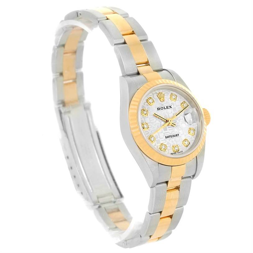 The Rolex Datejust 79173 Women's Stainless Steel Silver Dial 79173 Women's Stainless Steel Silver Dial watch is shown at a slight angle, highlighting its face, bezel, and two-tone bracelet.