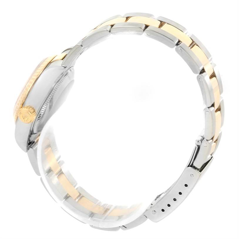 The image shows a side view of a Rolex Datejust 79173 Women's Stainless Steel Silver Dial 79173 Women's Stainless Steel Silver Dial watch, highlighting the bracelet and the crown on the side of the case.