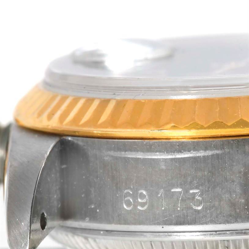 The image shows a close-up side view of a Rolex Datejust 69173 Women's Stainless Steel Black Dial 69173 Women's Stainless Steel Black Dial watch, focusing on the bezel and case with the model number 69173.