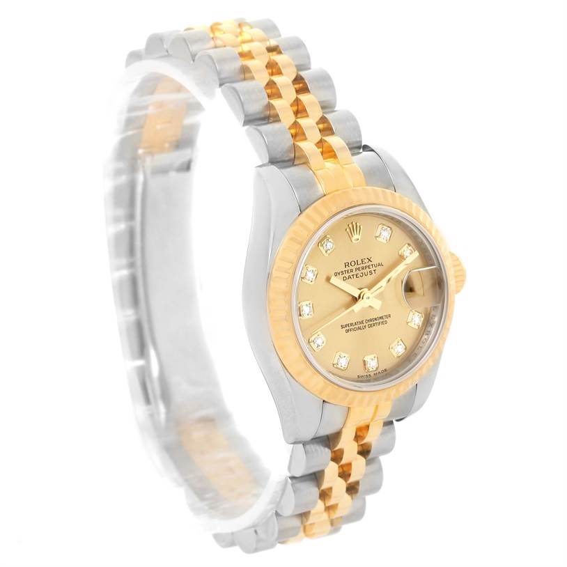 The image shows a Rolex Datejust 179173 Women's Steel and Gold (two tone) Champagne Dial 179173 Women's Steel and Gold (two tone) Champagne Dial watch at a slight angle, highlighting its two-tone bracelet, bezel, and diamond hour markers.
