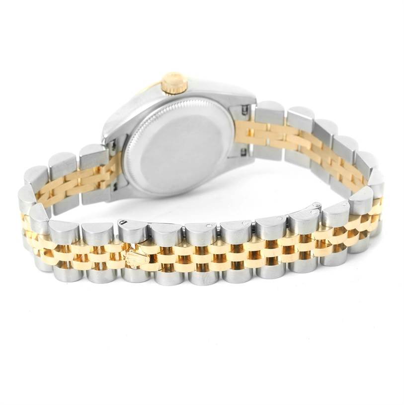 This image shows the back and partially closed two-tone bracelet of a Rolex Datejust 179173 Women's Steel and Gold (two tone) Champagne Dial 179173 Women's Steel and Gold (two tone) Champagne Dial watch.