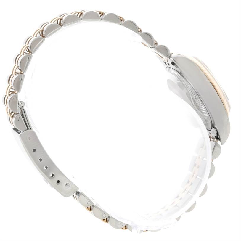 The image shows the side view of a Rolex Datejust 79173 Women's Steel and Gold (two tone) Mother of Pearl Dial 79173 Women's Steel and Gold (two tone) Mother of Pearl Dial watch band and case, highlighting the bracelet links and a portion of the case.