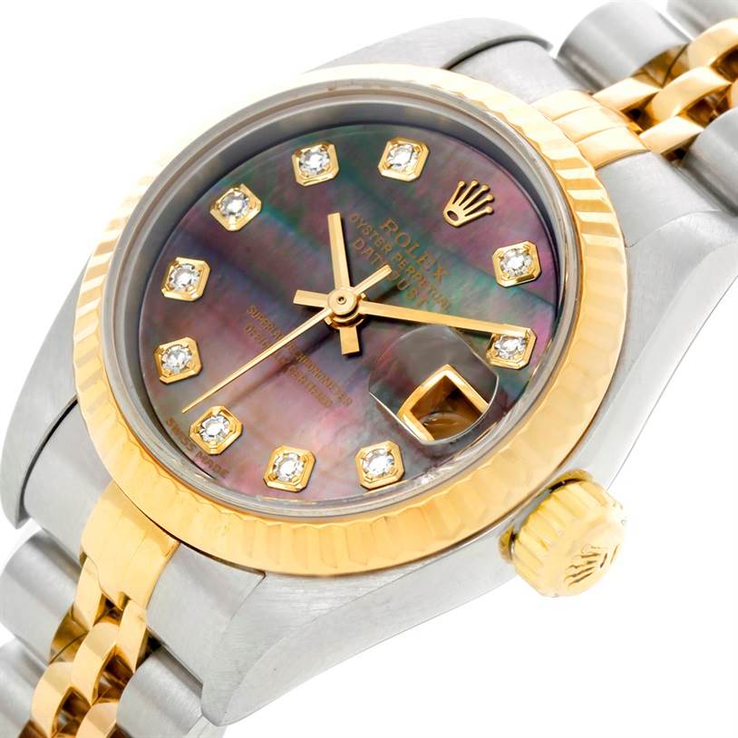 This image shows a close-up angle of a Rolex Datejust 79173 Women's Steel and Gold (two tone) Mother of Pearl Dial 79173 Women's Steel and Gold (two tone) Mother of Pearl Dial watch, focusing on the dial, bezel, crown, and part of the bracelet.