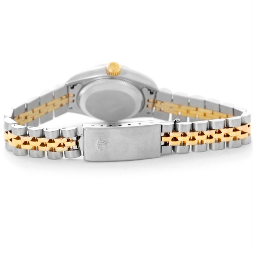 The image shows the back of a Rolex Datejust 79173 Women's Steel and Gold (two tone) Mother of Pearl Dial 79173 Women's Steel and Gold (two tone) Mother of Pearl Dial watch, focusing on its two-tone metal bracelet and closed clasp.