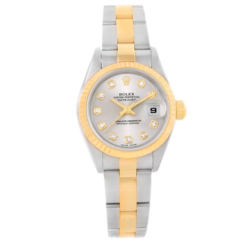 The Rolex Datejust 79173 Women
s Stainless Steel Silver Dial 79173 Women
s Stainless Steel Silver Dial watch is shown from a top-down angle, highlighting its two-tone bracelet, gold bezel, and dial with date display.