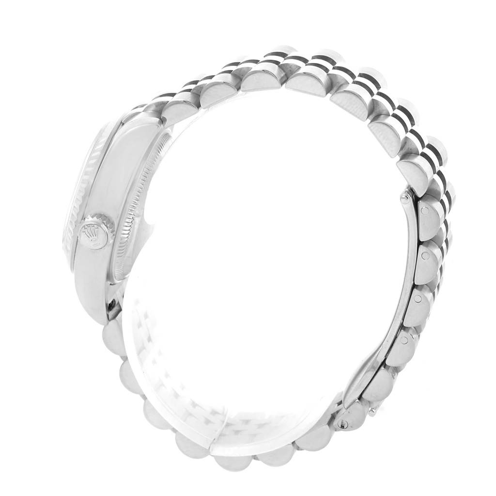 The image displays a side angle of a Rolex Datejust 179174 Women's Stainless Steel White Dial 179174 Women's Stainless Steel White Dial, showing the crown and part of the bracelet.