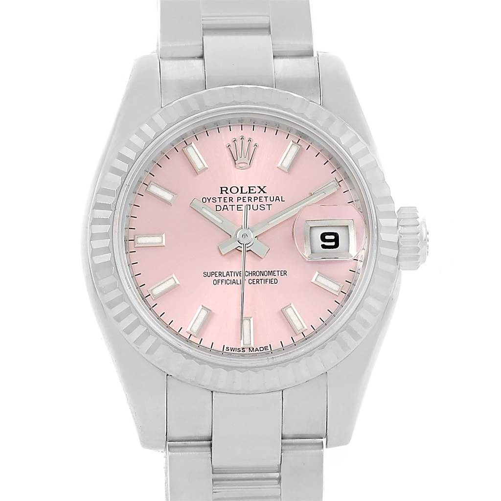 This image shows a Rolex Datejust 179174 Women's Stainless Steel Pink Dial 179174 Women's Stainless Steel Pink Dial watch from a front angle, highlighting its pink dial, silver bracelet, and date display.