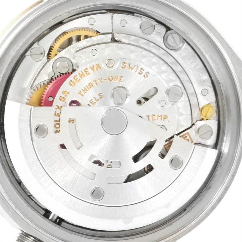 The image shows the movement mechanism of a Rolex Datejust 79173 Women
s Stainless Steel White Dial 79173 Women
s Stainless Steel White Dial watch.