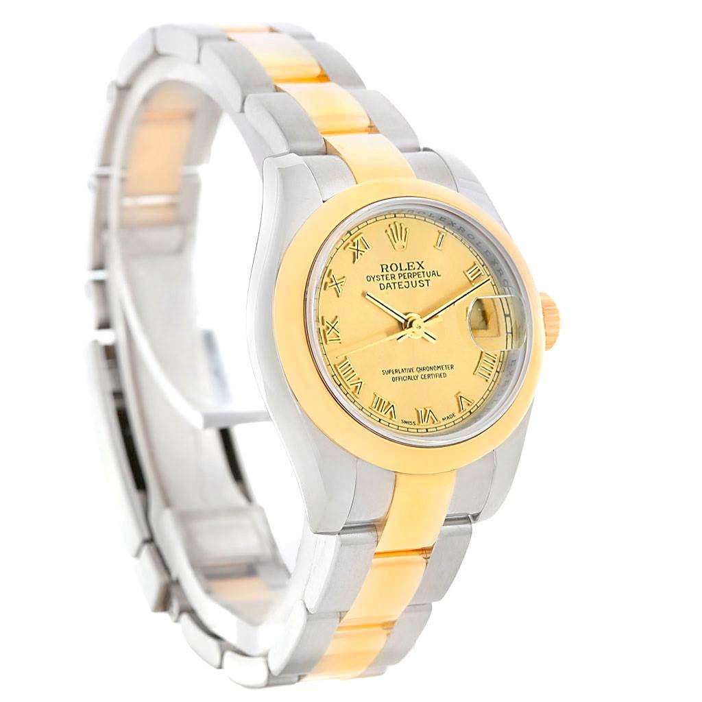 The image shows a Rolex Datejust 179163 Women's Steel and Gold (two tone) Champagne Dial 179163 Women's Steel and Gold (two tone) Champagne Dial watch angled from the front left, highlighting the face, bezel, and two-tone bracelet.