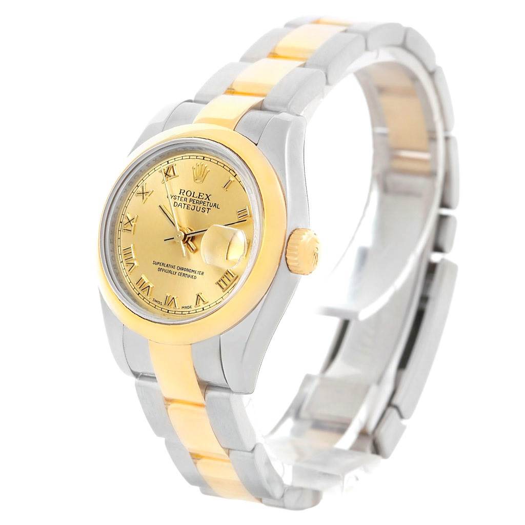 This image shows a Rolex Datejust 179163 Women's Steel and Gold (two tone) Champagne Dial 179163 Women's Steel and Gold (two tone) Champagne Dial watch at an angle, highlighting the gold and silver bracelet, dial, and crown.