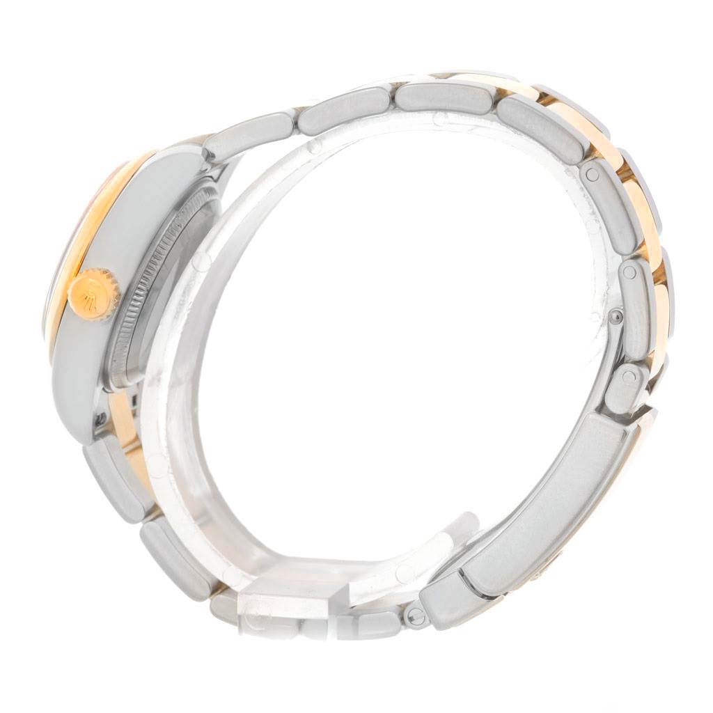 The image shows a side view of a Rolex Datejust 179163 Women's Steel and Gold (two tone) Champagne Dial 179163 Women's Steel and Gold (two tone) Champagne Dial watch, highlighting its bracelet and crown.