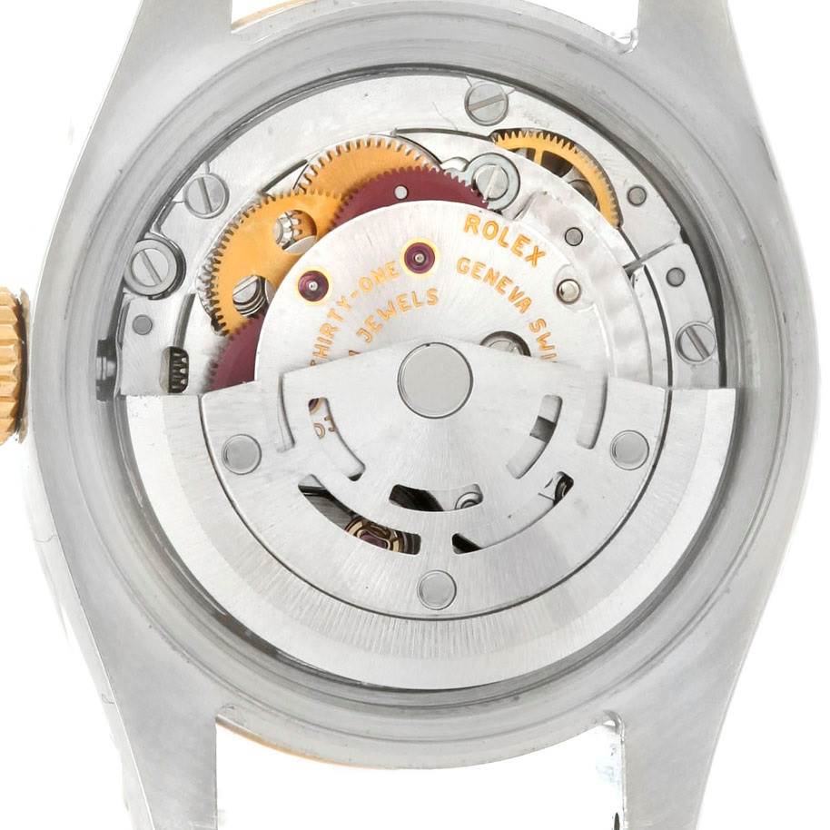 The image shows the backside of the Rolex Datejust 179163 Women's Steel and Gold (two tone) Champagne Dial 179163 Women's Steel and Gold (two tone) Champagne Dial watch, highlighting its internal movement mechanism.