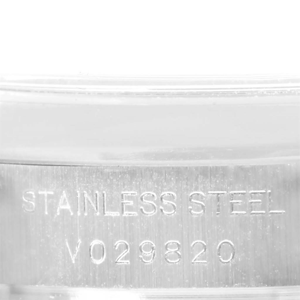 The image shows a close-up angle of the stainless steel serial number engraving on the case of a Rolex Datejust 179160 Women
s Stainless Steel Silver Dial 179160 Women
s Stainless Steel Silver Dial watch.