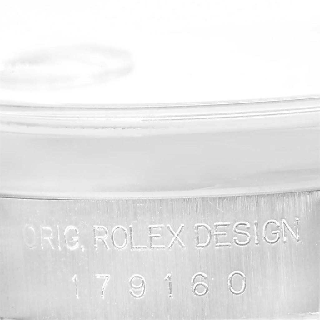 The image shows a close-up of the case side of a Rolex Datejust 179160 Women
s Stainless Steel Silver Dial 179160 Women
s Stainless Steel Silver Dial watch, featuring the engraved design and model number "179160."