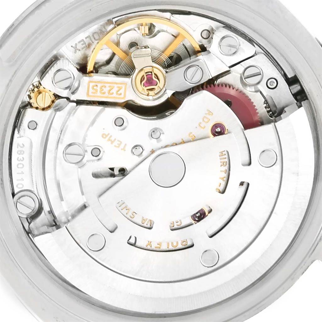This image shows a close-up of the movement mechanism of a Rolex Datejust 179160 Women
s Stainless Steel Silver Dial 179160 Women
s Stainless Steel Silver Dial watch.
