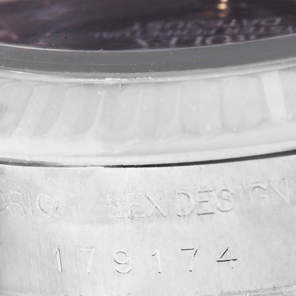 This close-up image shows the engraved bezel and case, revealing the model number of the Rolex Datejust 179174 Women
s Stainless Steel Mother of Pearl Dial 179174 Women
s Stainless Steel Mother of Pearl Dial.