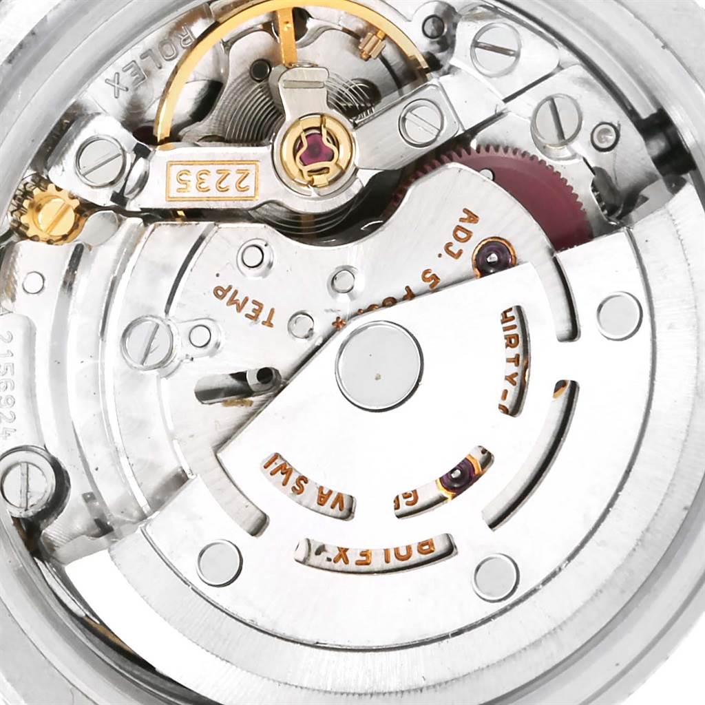 The image shows the inner mechanical movement of a Rolex Datejust 179174 Women
s Stainless Steel Mother of Pearl Dial 179174 Women
s Stainless Steel Mother of Pearl Dial watch including the balance wheel, movement caliber, and rotor.