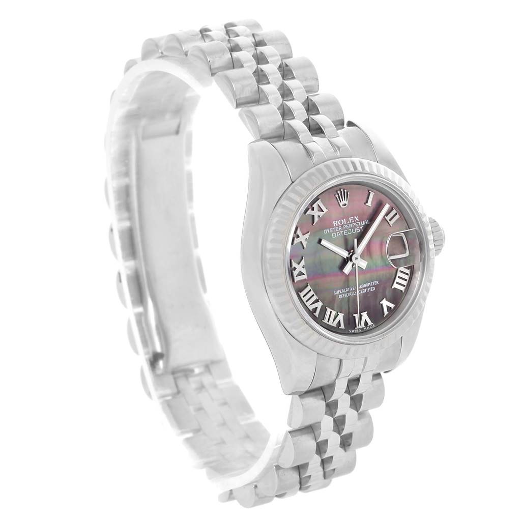The image shows a Rolex Datejust 179174 Women
s Stainless Steel Mother of Pearl Dial 179174 Women
s Stainless Steel Mother of Pearl Dial watch angled from the front-right, displaying the dial, case, and part of the bracelet.