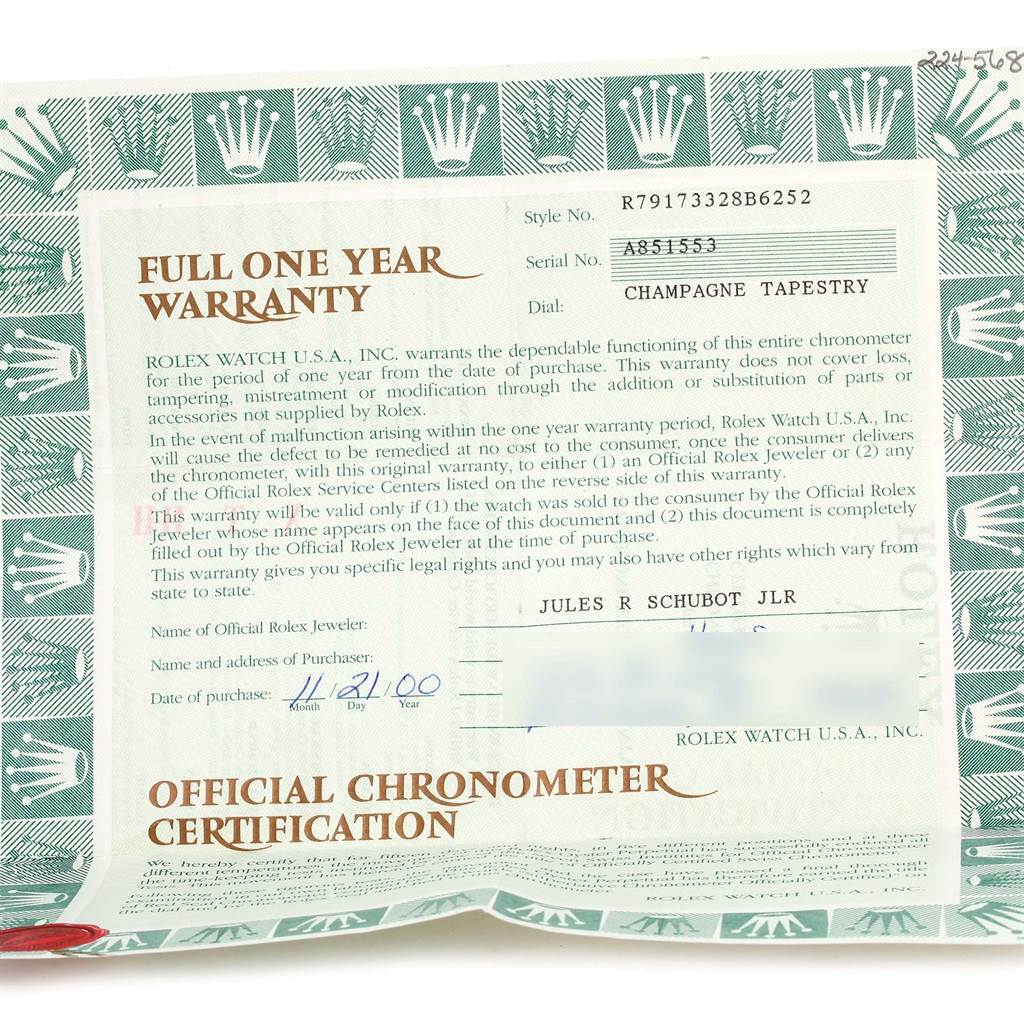 The image shows a full one-year warranty card from Rolex for the Datejust model, including the official chronometer certification.