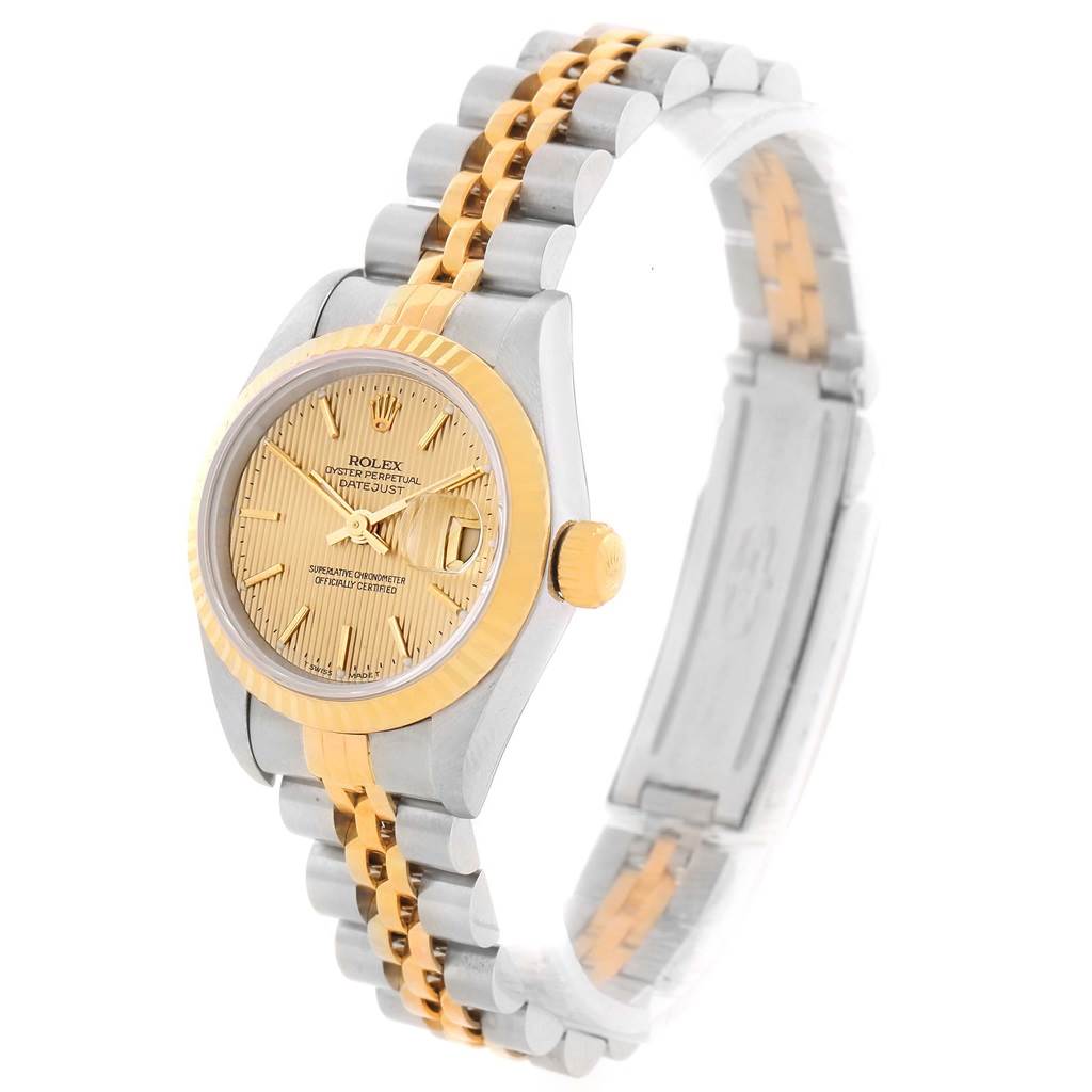 The image shows a Rolex Datejust 79173 Women
s Stainless Steel Champagne Dial 79173 Women
s Stainless Steel Champagne Dial watch at a slight angle, highlighting its gold and silver bracelet, gold bezel, and gold watch face.