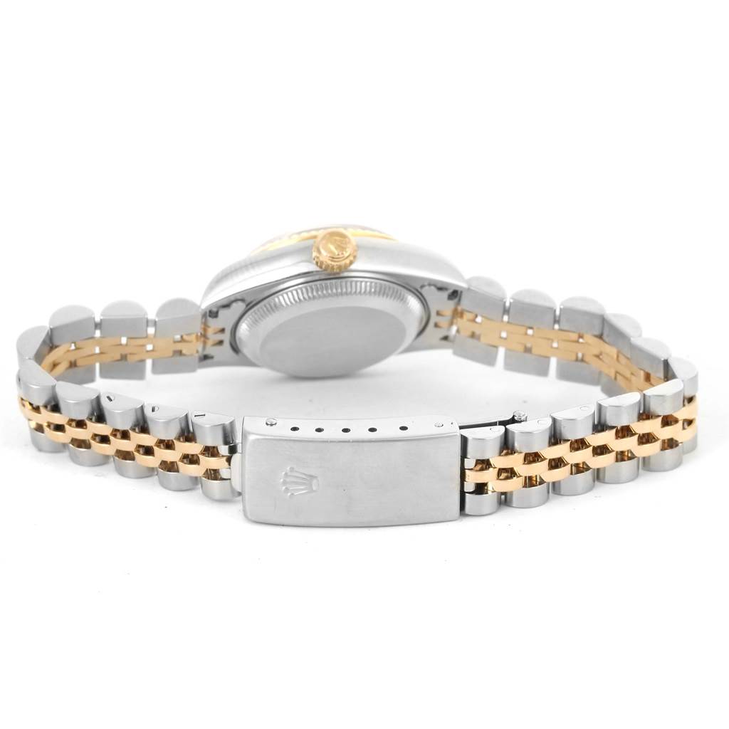 The image shows the back and bracelet of a Rolex Datejust 79173 Women
s Stainless Steel Champagne Dial 79173 Women
s Stainless Steel Champagne Dial watch, highlighting the clasp and two-tone metal links.