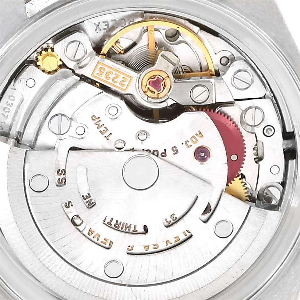 This image shows a close-up view of the Rolex Datejust 79173 Women
s Stainless Steel Champagne Dial 79173 Women
s Stainless Steel Champagne Dial watch movement, highlighting gears and internal components.